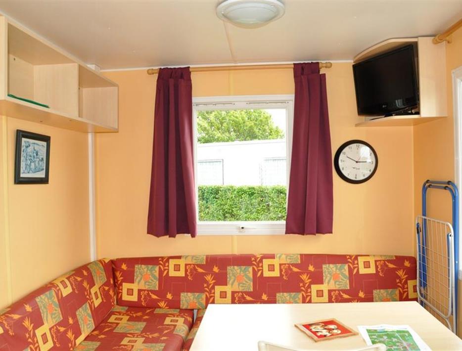 living room of mobil-home super astria 1 room 2 people camping *** de la motte in quend, picardie somme